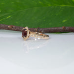 14K yellow gold red spinel ring with diamond accents