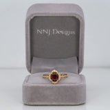 14K yellow gold red spinel ring with diamond accents