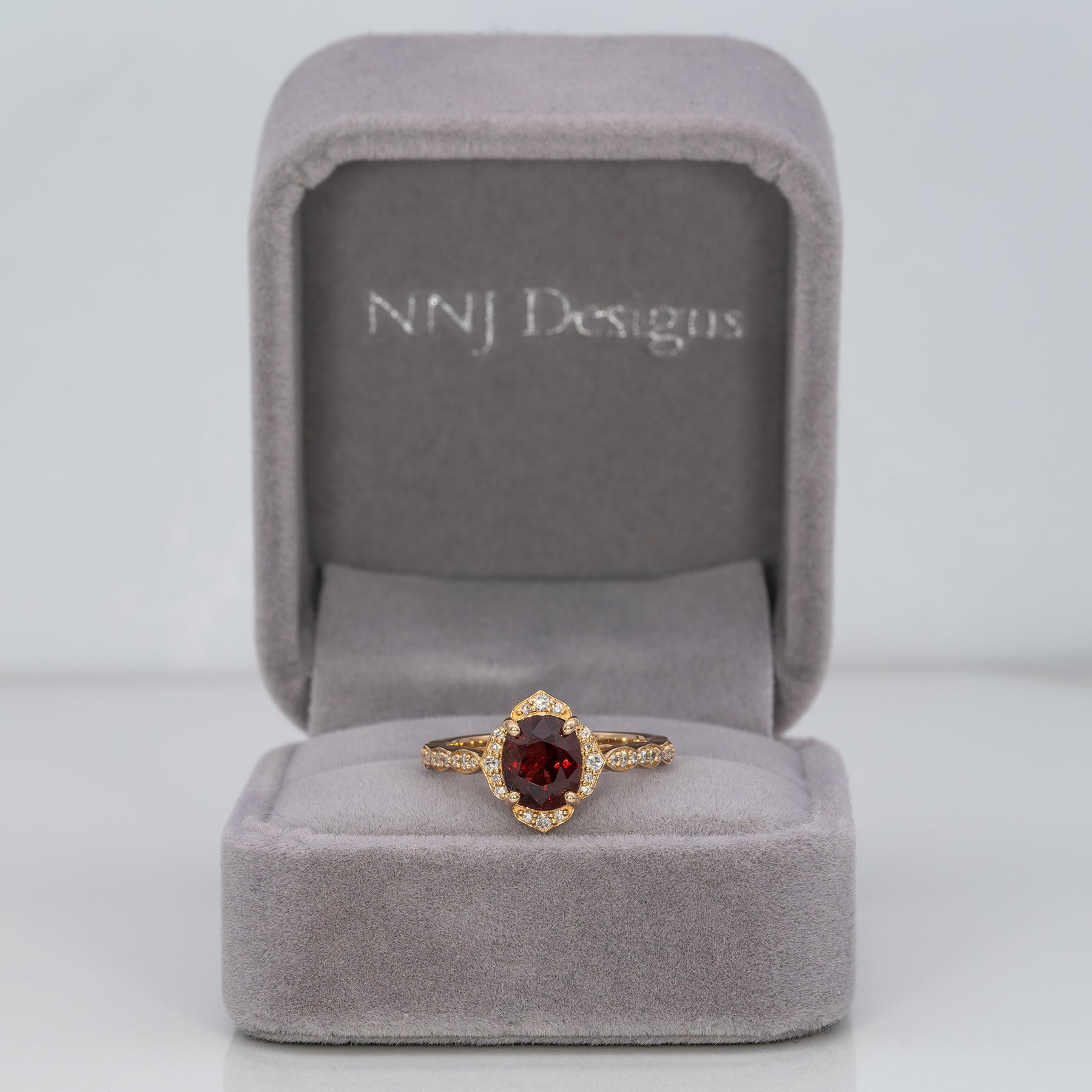 14K yellow gold red spinel ring with diamond accents