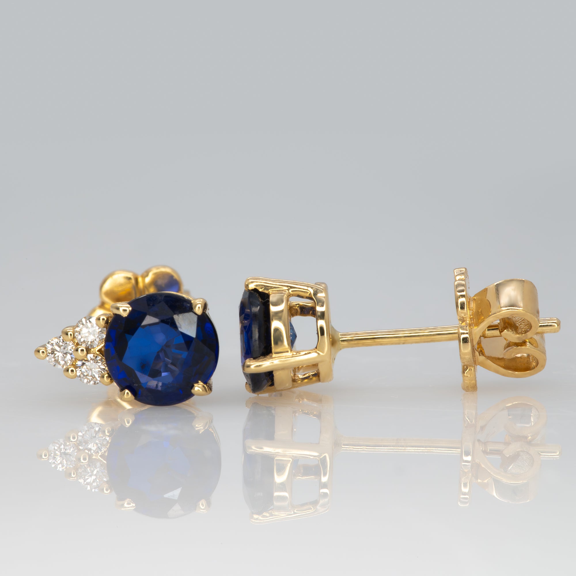 14K yellow gold Ceylon blue sapphire stud earrings with diamonds