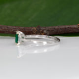 14K white gold Colombian emerald ring with diamond accents