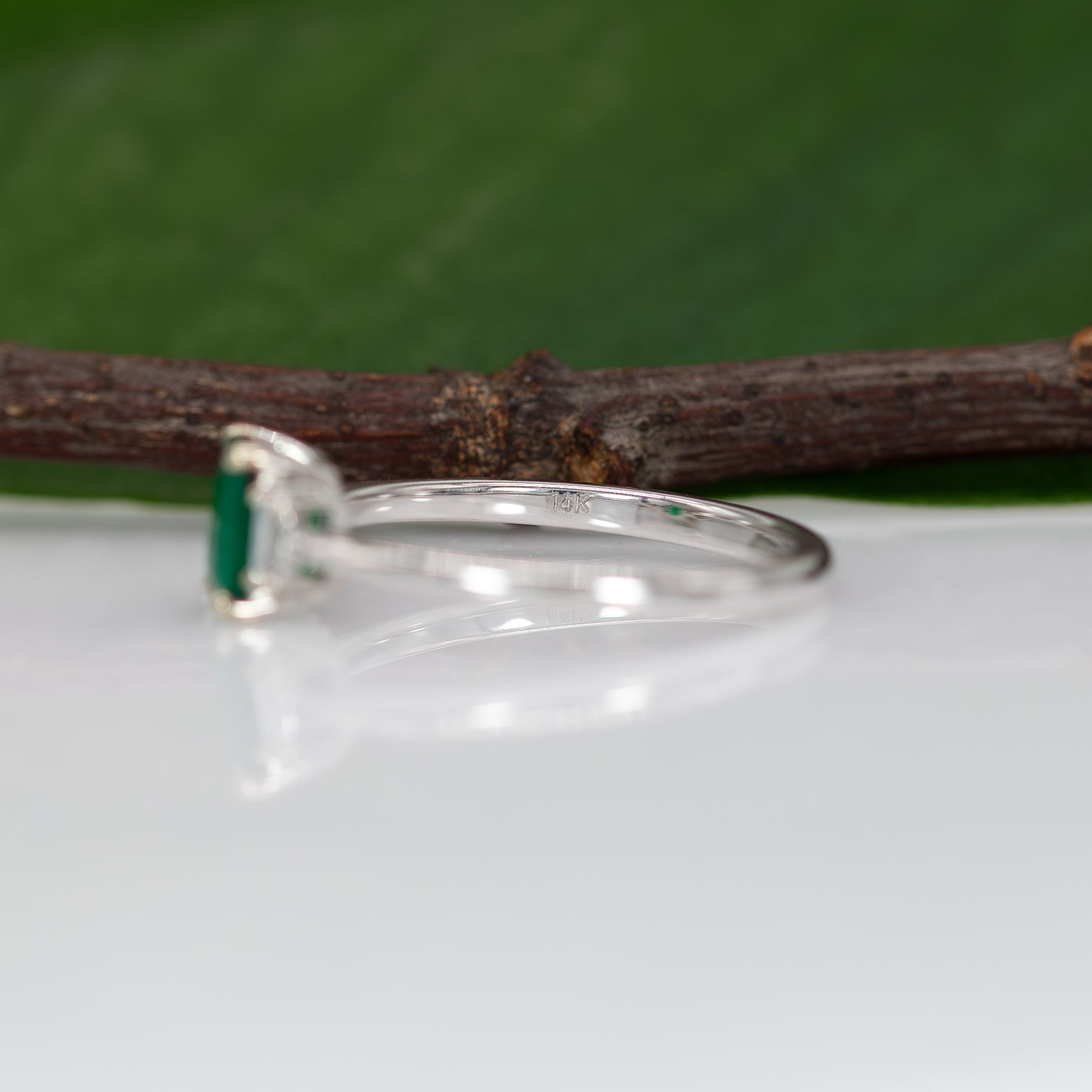 14K white gold Colombian emerald ring with diamond accents