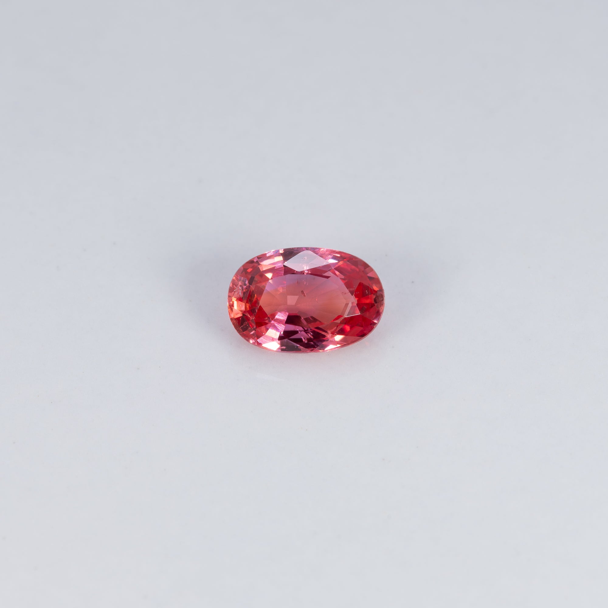 0.58 carat natural padparadscha sapphire, oval 6x4mm pink-orange loose gemstone