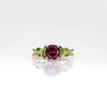 14K yellow gold purple garnet ring with tsavorite accents