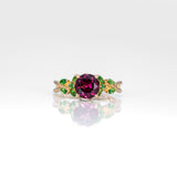 14K yellow gold purple garnet ring with tsavorite accents
