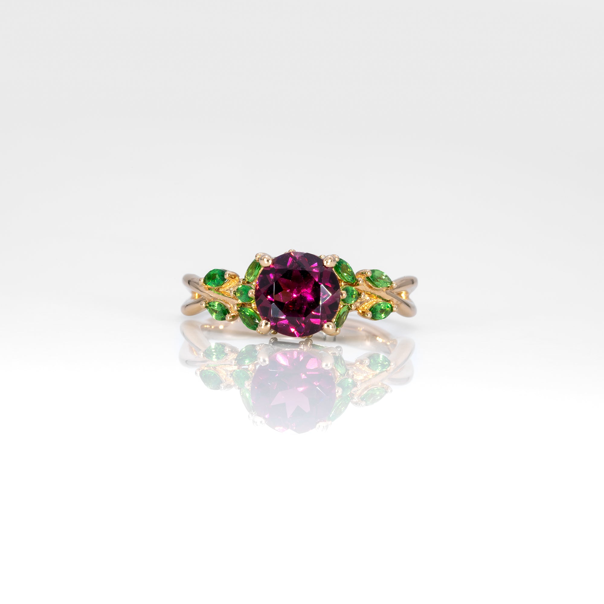 14K yellow gold purple garnet ring with tsavorite accents
