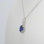 14K white gold tanzanite pendant