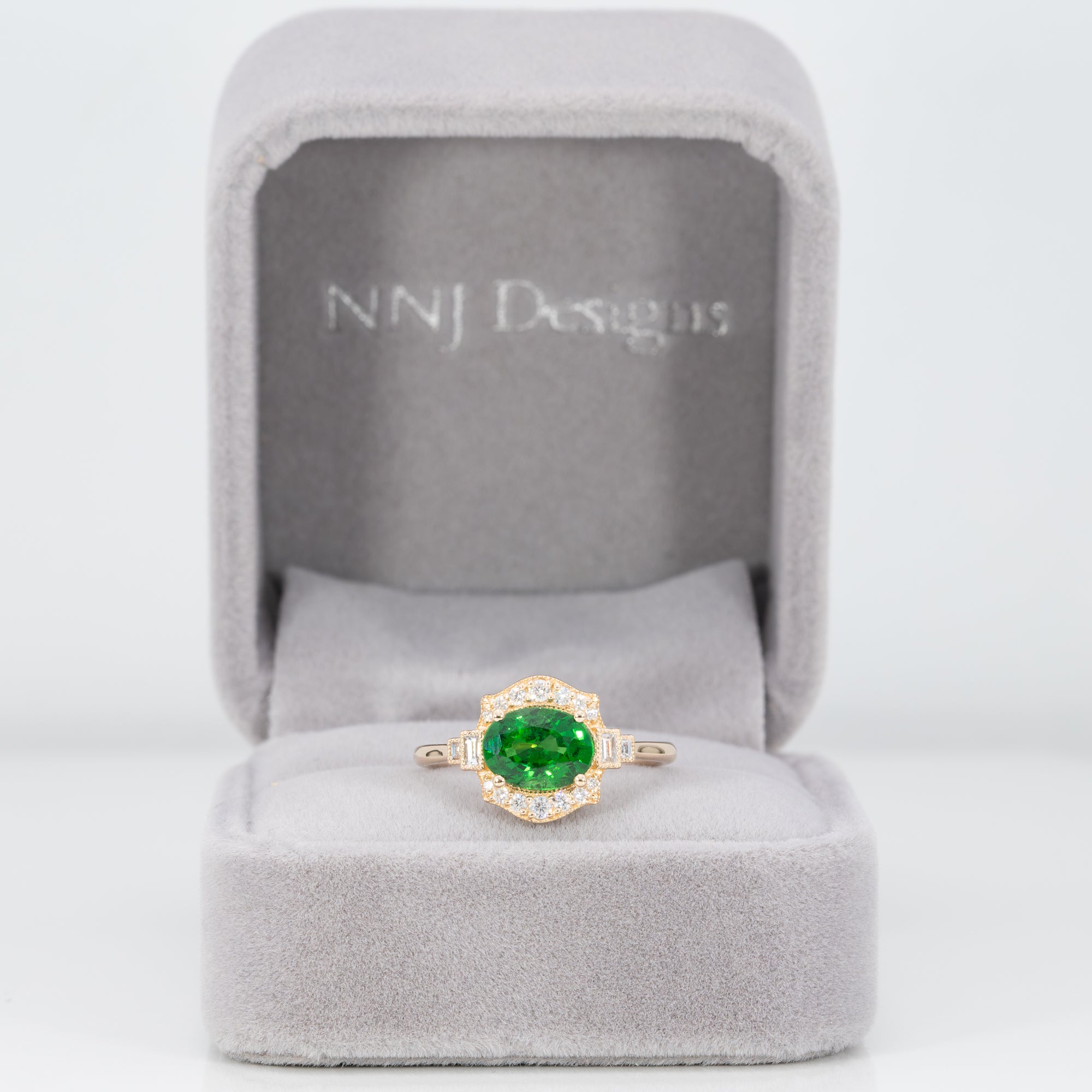 14K yellow gold tsavorite garnet ring with diamond accents