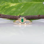 14K yellow gold colombian emerald ring with diamond accents