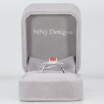 14K white gold padparadscha sapphire ring with diamond accents