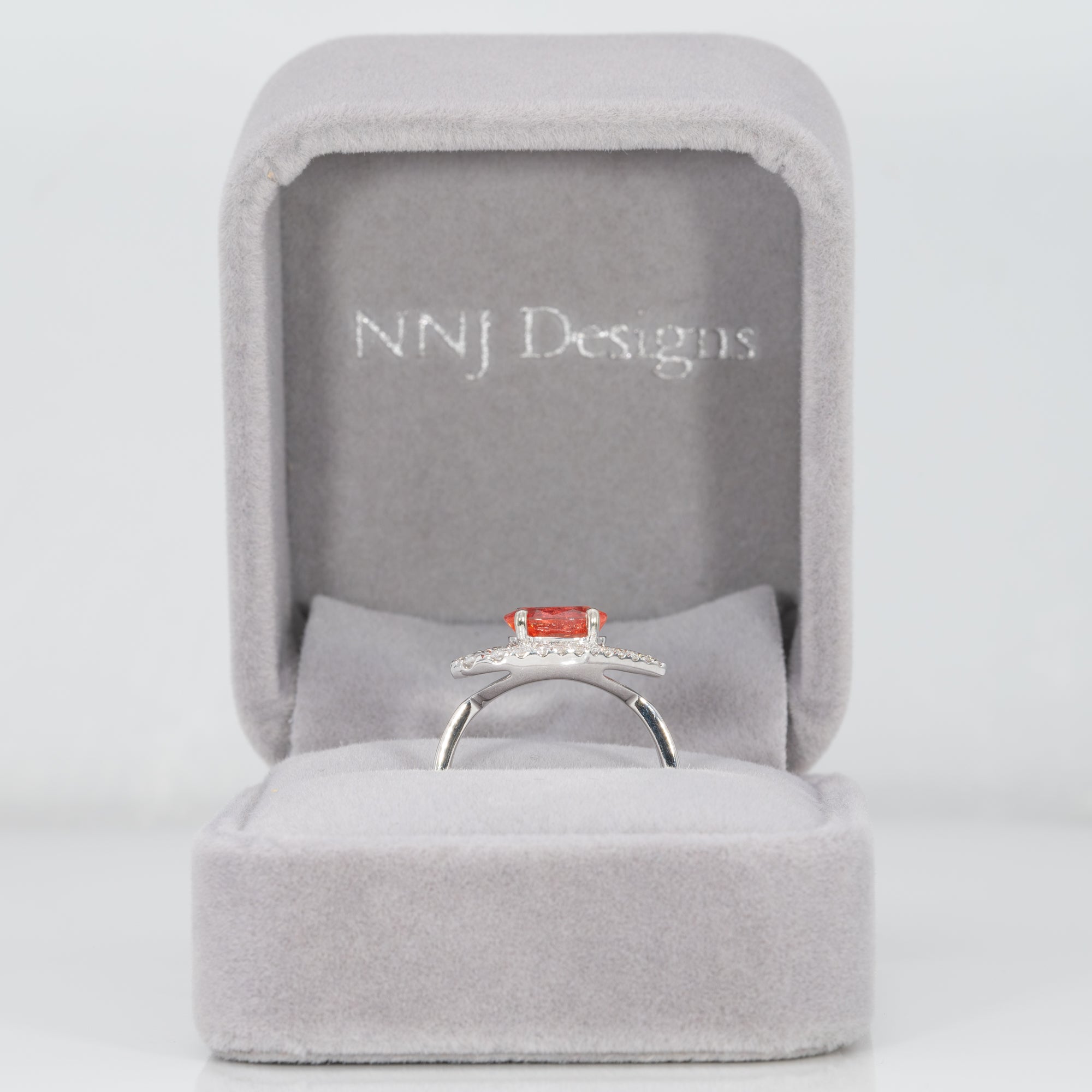 14K white gold padparadscha sapphire ring with diamond accents