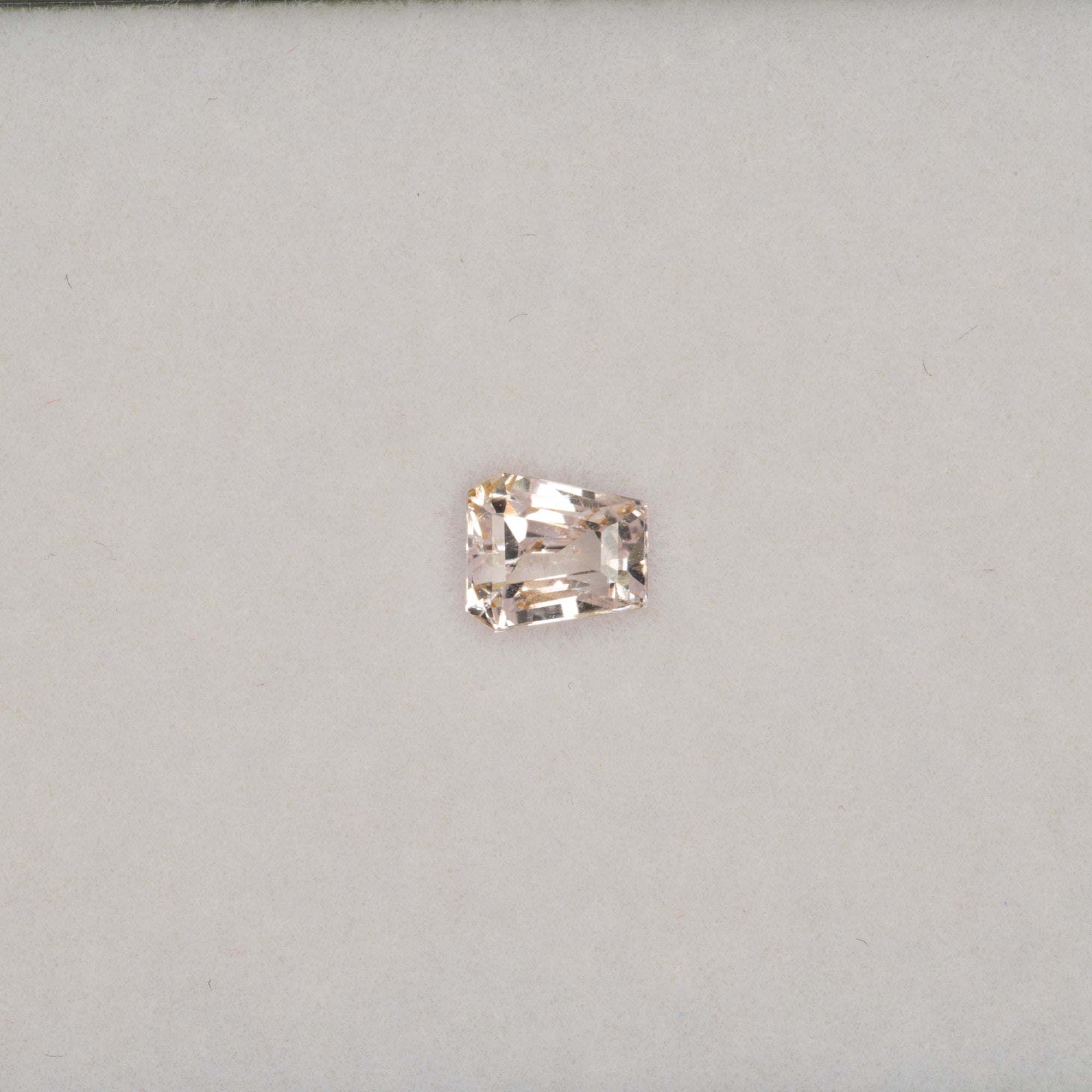 0.89 carat natural peach sapphire, shield cut 5.4x4.8mm Ceylon loose gemstone