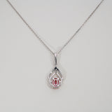 14K white gold padparadscha sapphire pendant