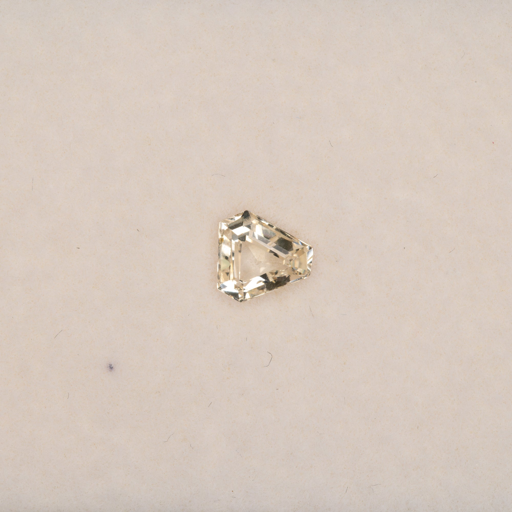 0.83 carat natural yellow sapphire, shield cut 5.8x5.7mm Ceylon loose gemstone