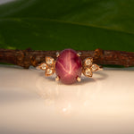 14K rose gold star ruby cabochon ring with diamond accents