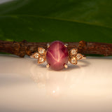 14K rose gold star ruby cabochon ring with diamond accents