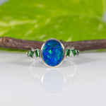 14K white gold boulder opal cabochon ring with tsavorite accents