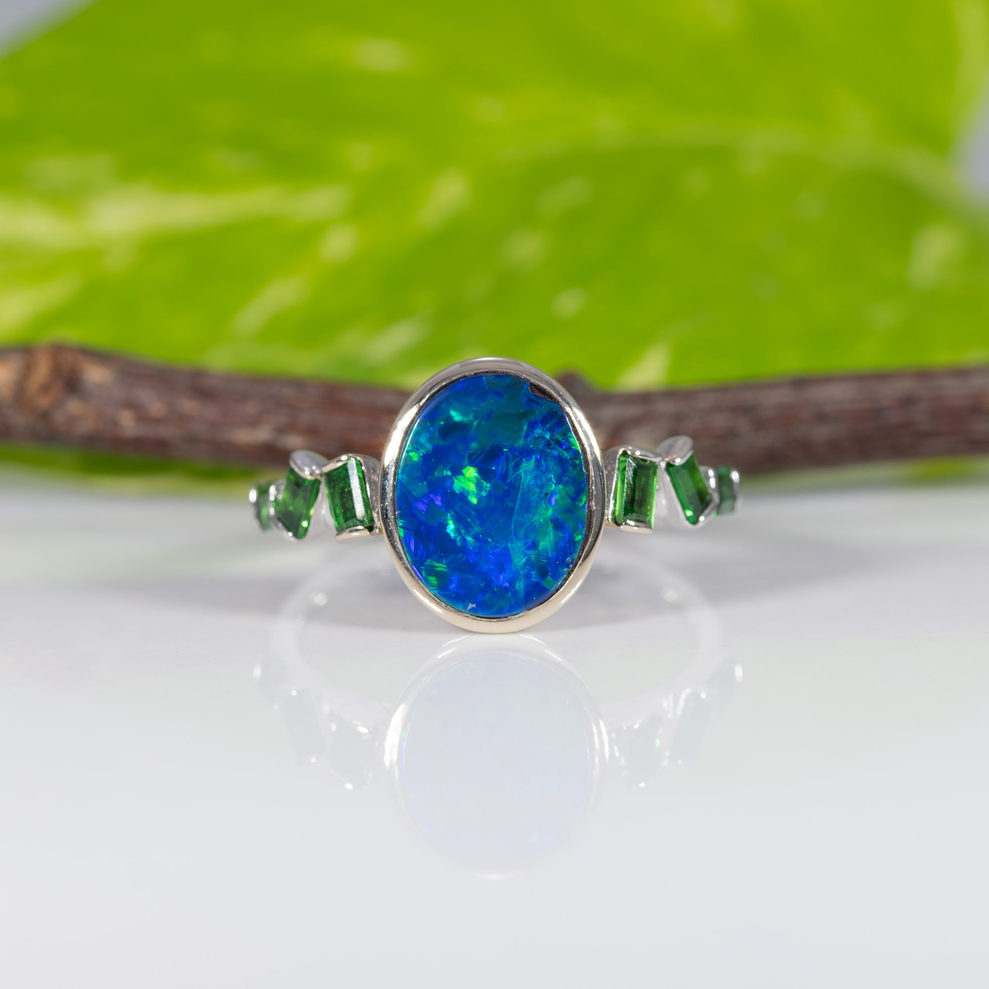14K white gold boulder opal cabochon ring with tsavorite accents