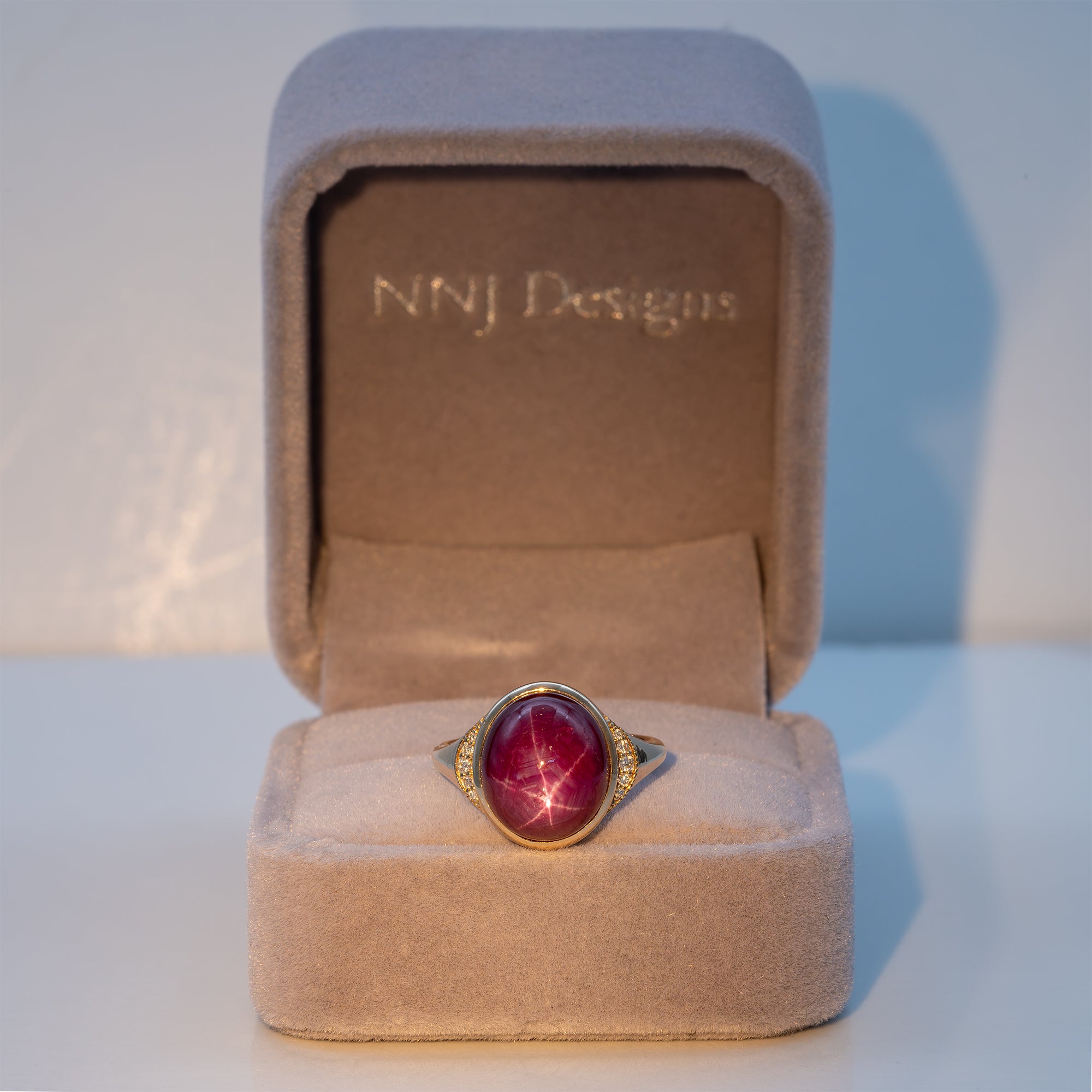 14K yellow gold star ruby cabochon ring with diamond accents