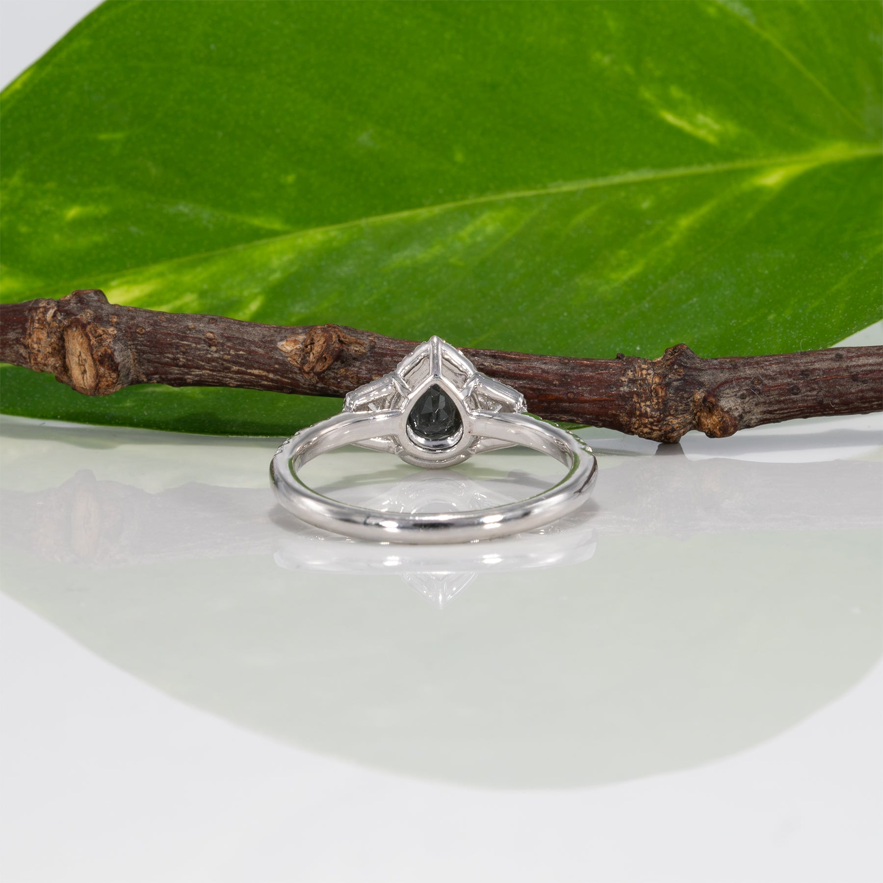 14K white gold pear alexandrite ring with diamond halo