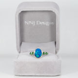 14K white gold boulder opal cabochon ring with tsavorite accents