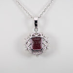 14K white gold rhodolite garnet pendant