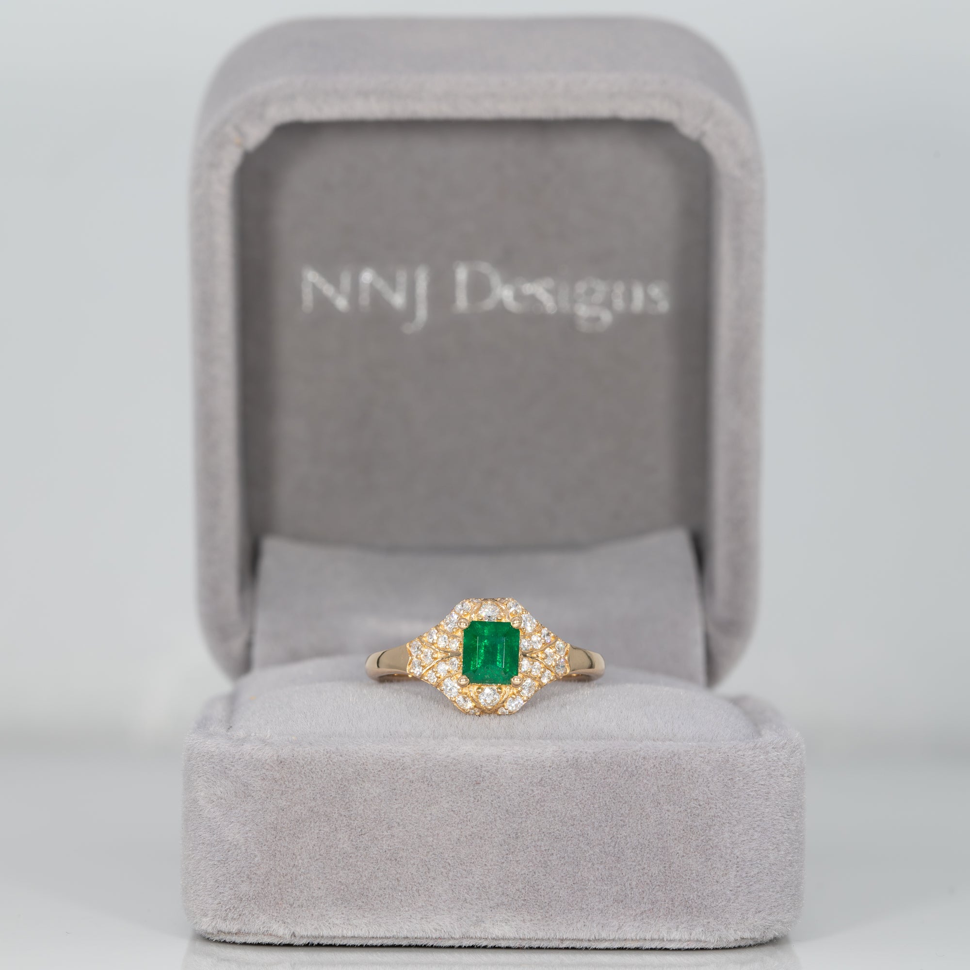 14K yellow gold Colombian emerald ring with diamond accents
