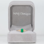 14K yellow gold colombian emerald ring with diamond accents