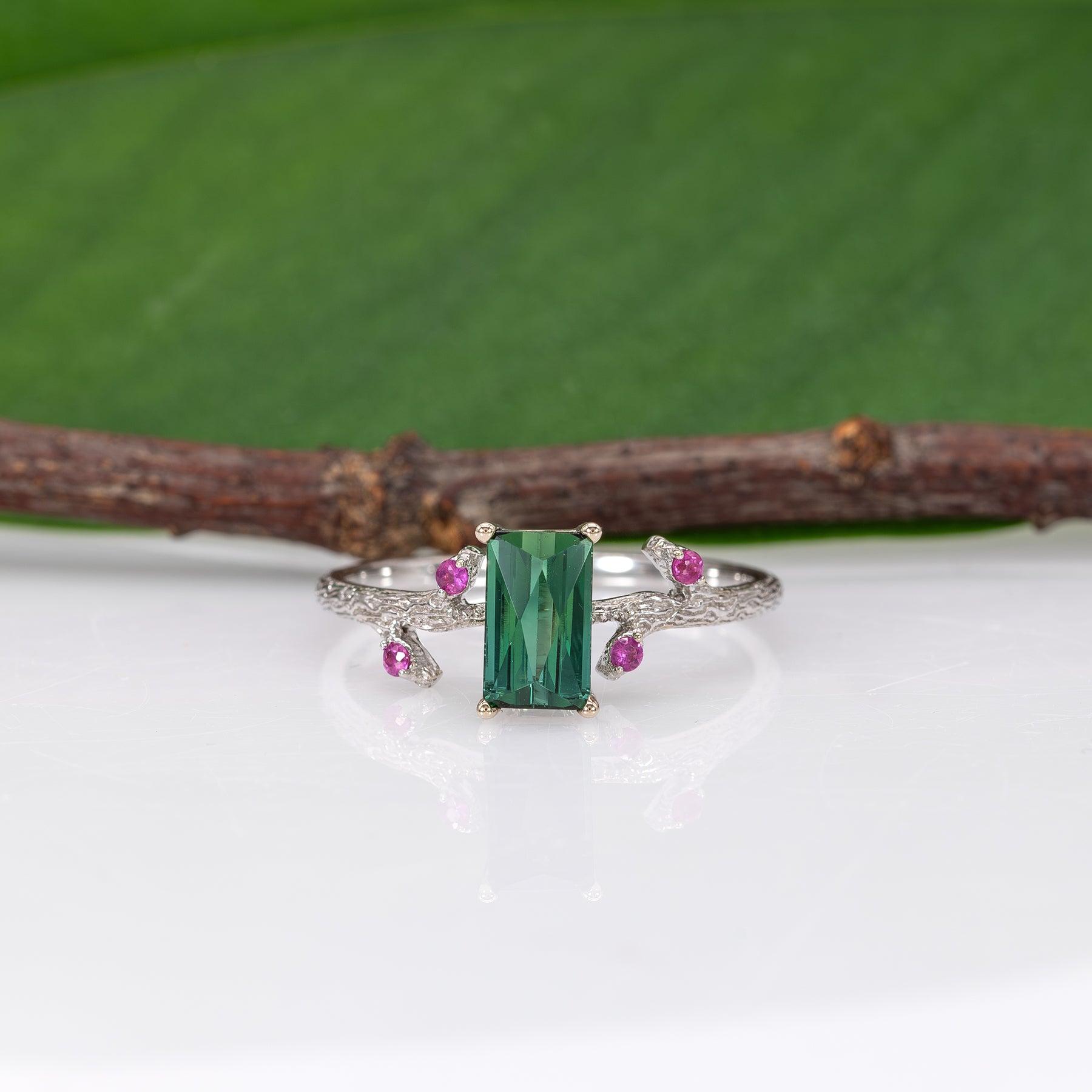 14K white gold indicolite tourmaline ring with pink sapphire accents