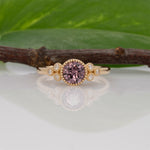 14K yellow gold purple spinel round ring with diamond accents