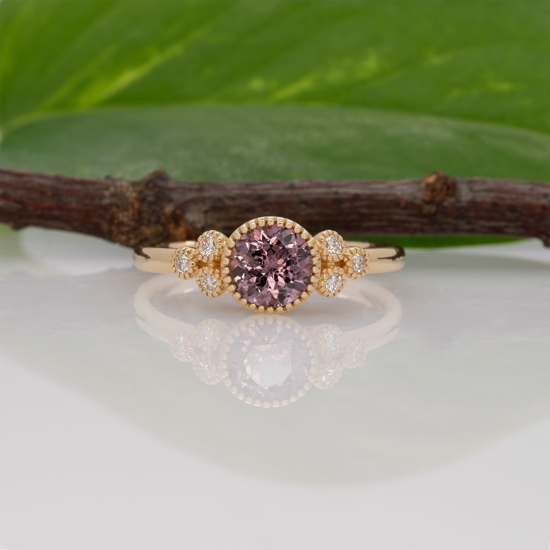 14K yellow gold purple spinel round ring with diamond accents