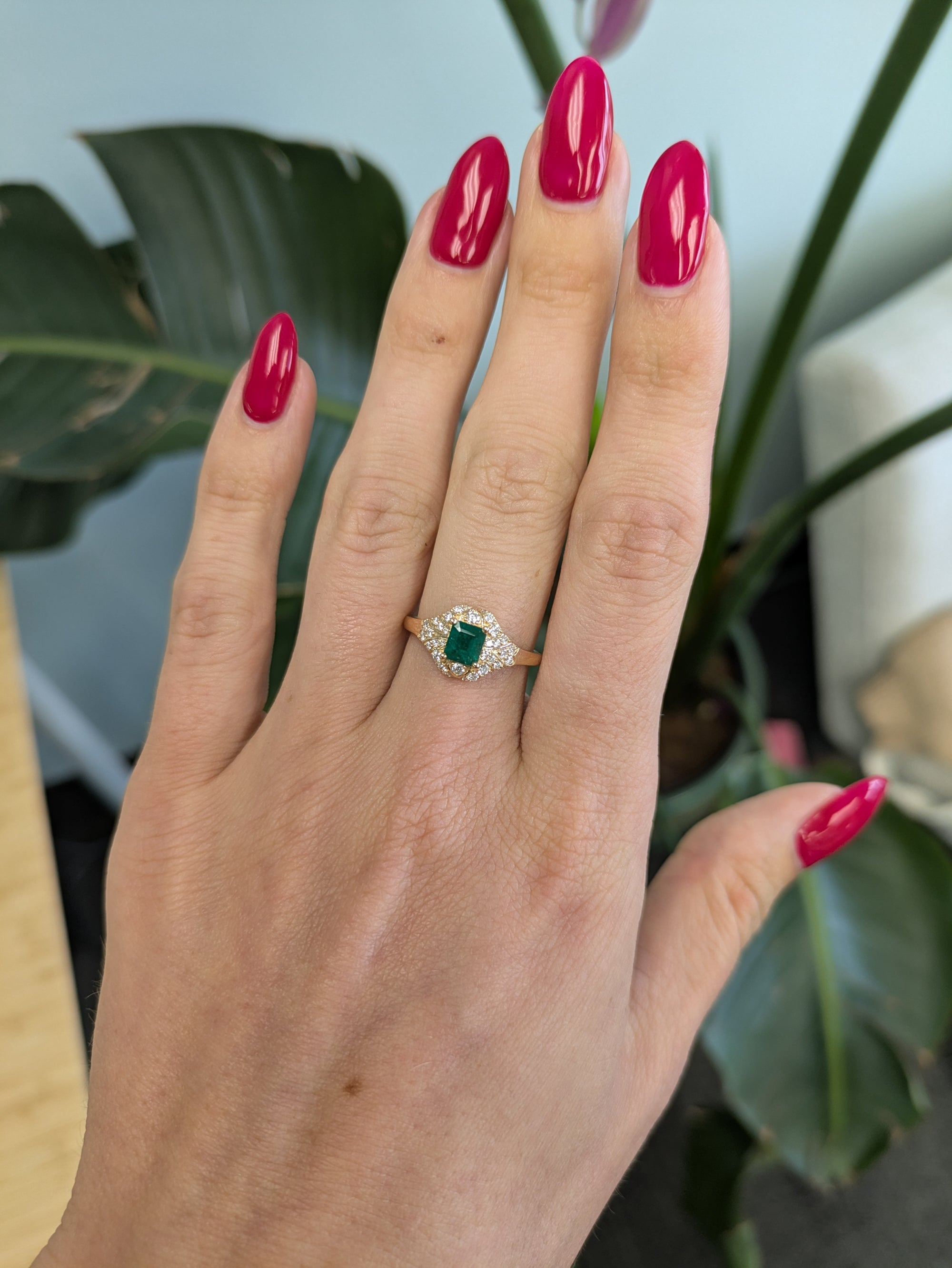 14K yellow gold Colombian emerald ring with diamond accents