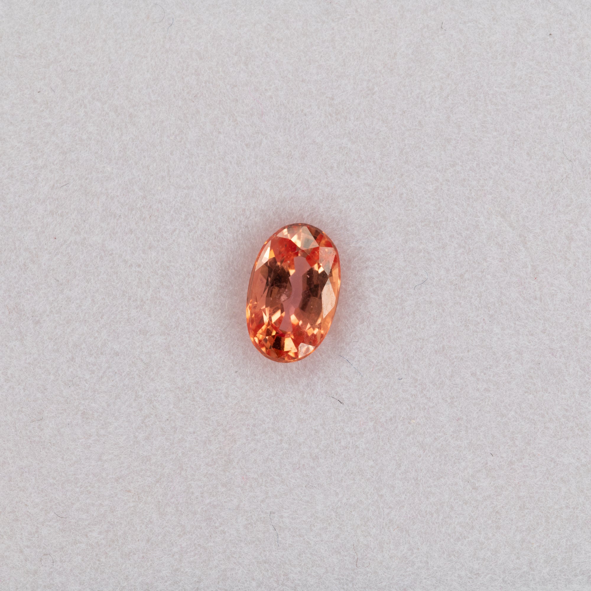 0.97 carat natural padparadscha sapphire, oval 7.3x4.7mm pink-orange loose gemstone