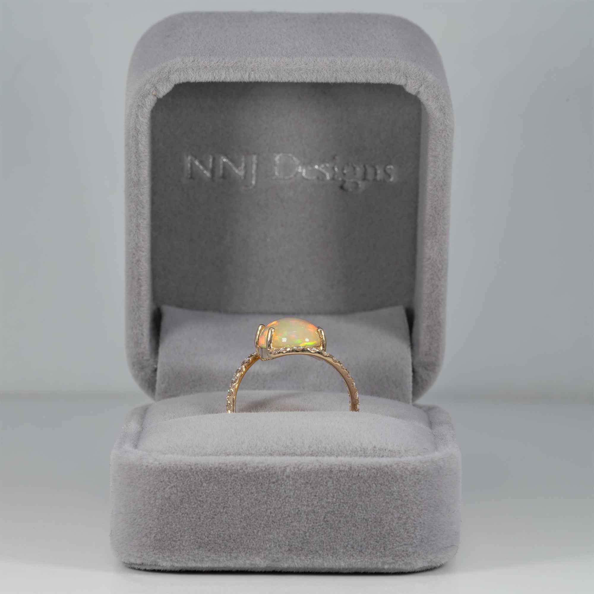 14K yellow gold Ethiopian opal cabochon ring with diamonds