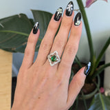 14K two-tone gold tsavorite garnet ring with diamond accents