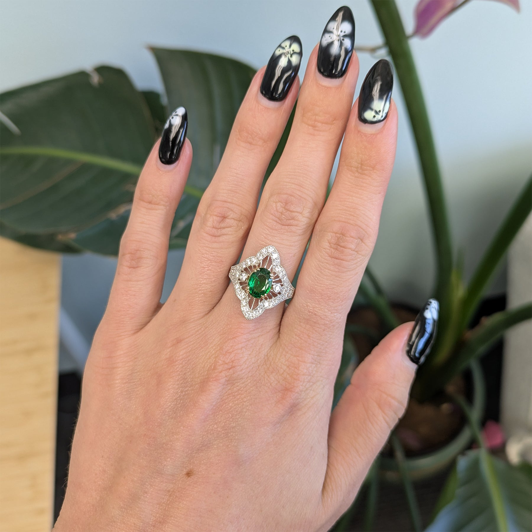 14K two-tone gold tsavorite garnet ring with diamond accents