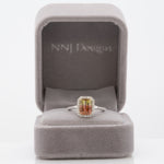 14K white gold bi-color tourmaline emerald-cut ring with diamond halo