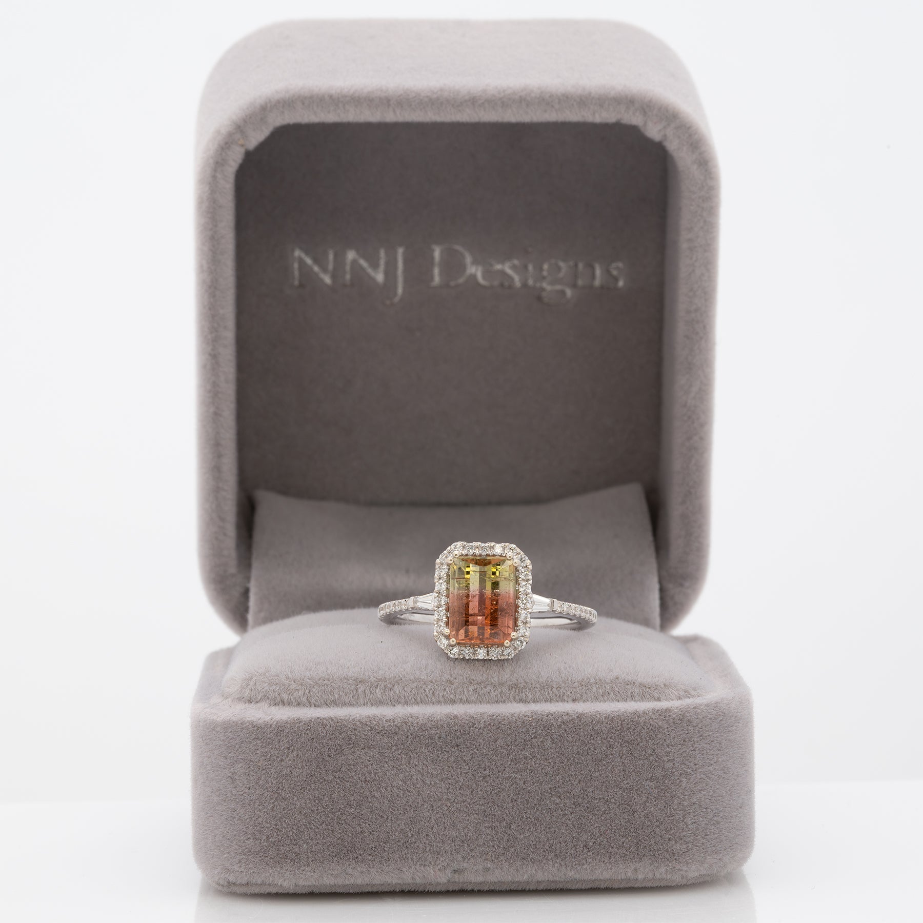 14K white gold bi-color tourmaline emerald-cut ring with diamond halo