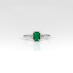 14K white gold Zambian emerald ring with diamond accents