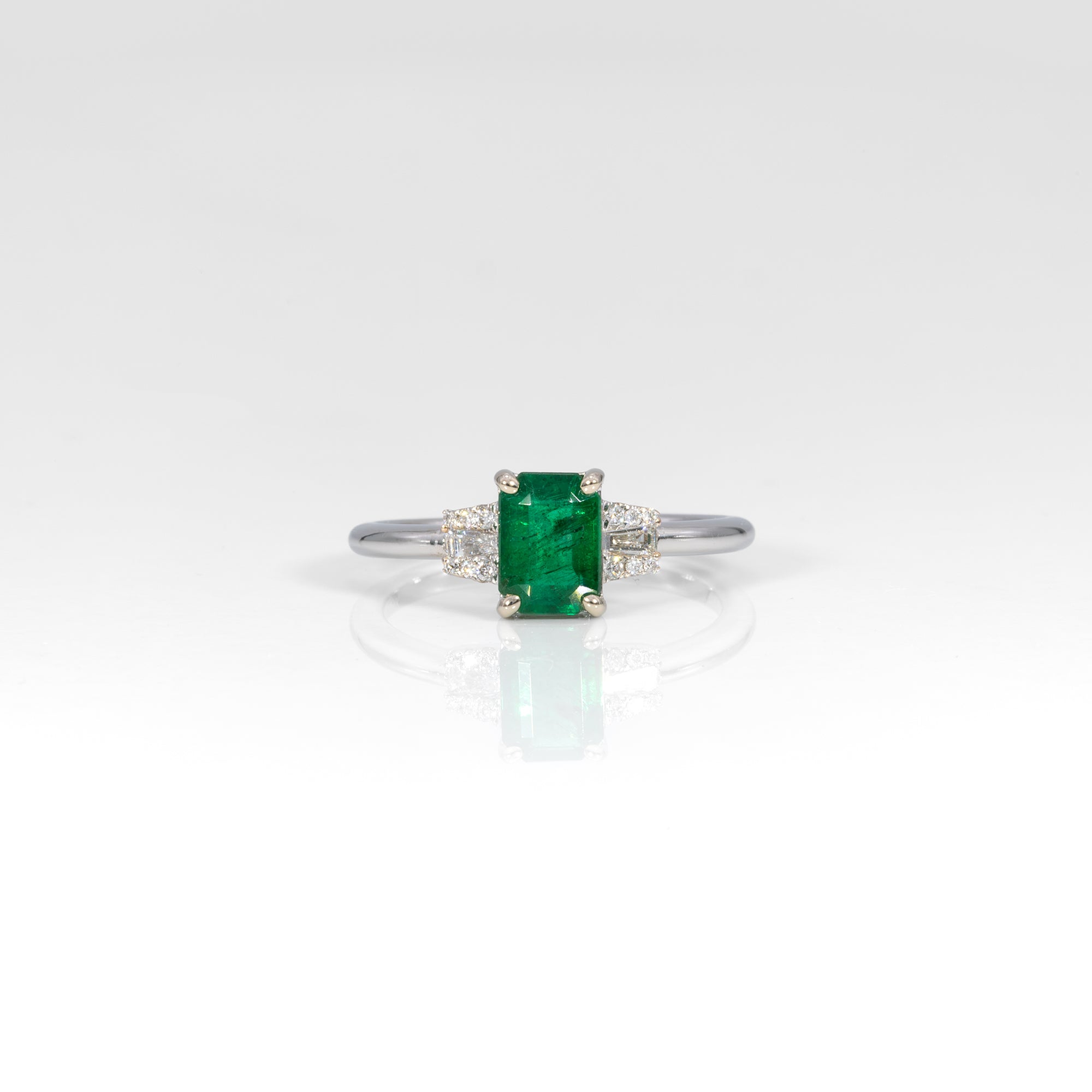 14K white gold Zambian emerald ring with diamond accents