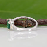 14K white gold Zambian emerald ring with diamond accents