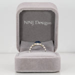 14K white gold blue star sapphire cabochon ring with diamonds