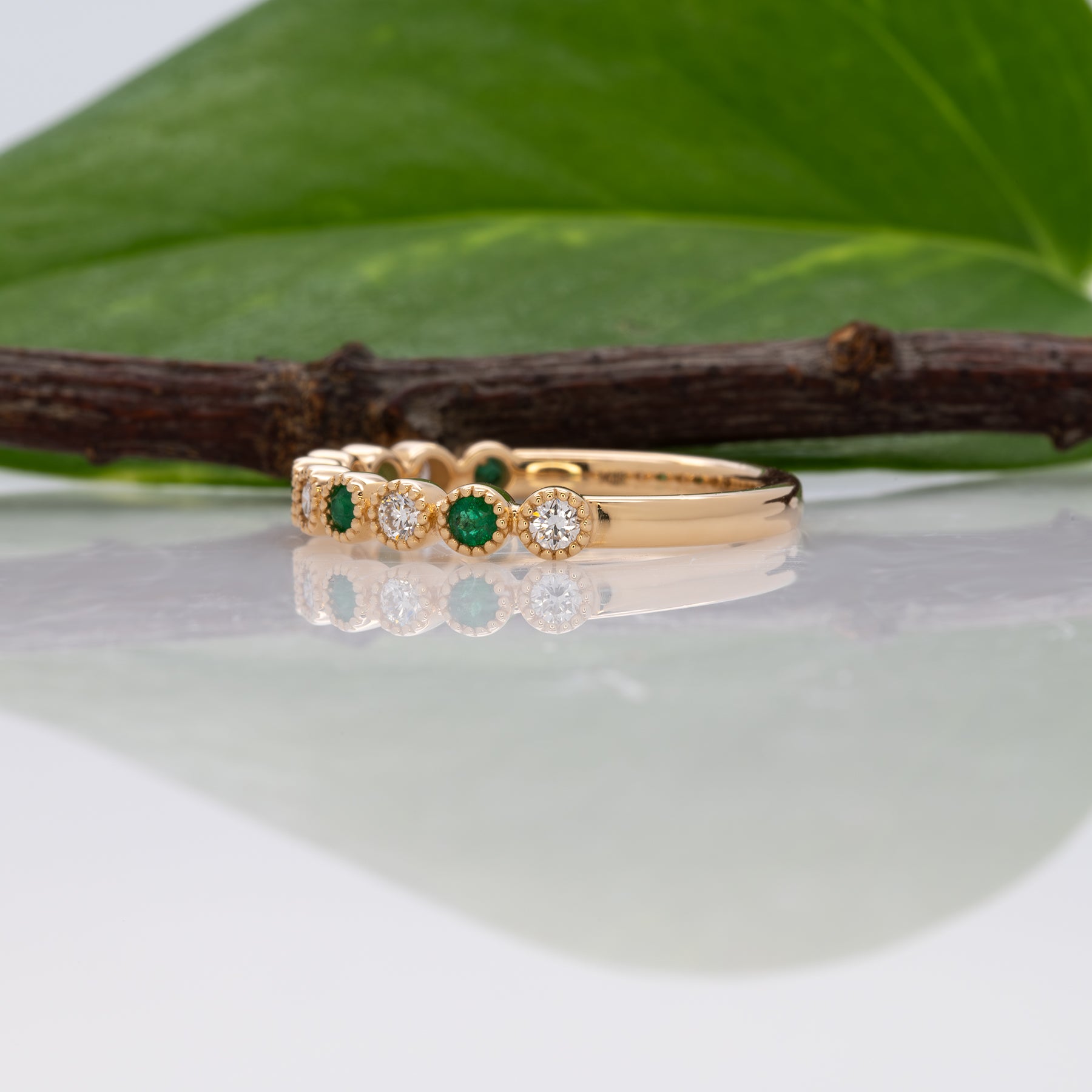 14K yellow gold Zambian emerald band ring with diamond accents