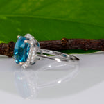 14K white gold Cambodian blue zircon cushion ring with diamond halo