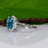 14K white gold Cambodian blue zircon cushion ring with diamond halo