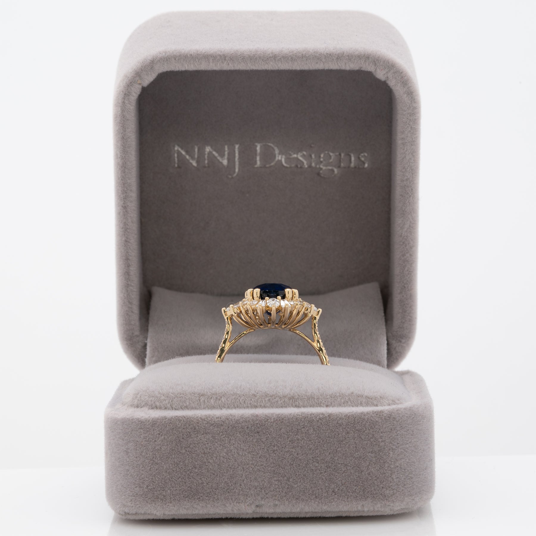 14K yellow gold GIA Ceylon sapphire cushion ring with diamond halo
