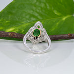 14K two-tone gold tsavorite garnet ring with diamond accents