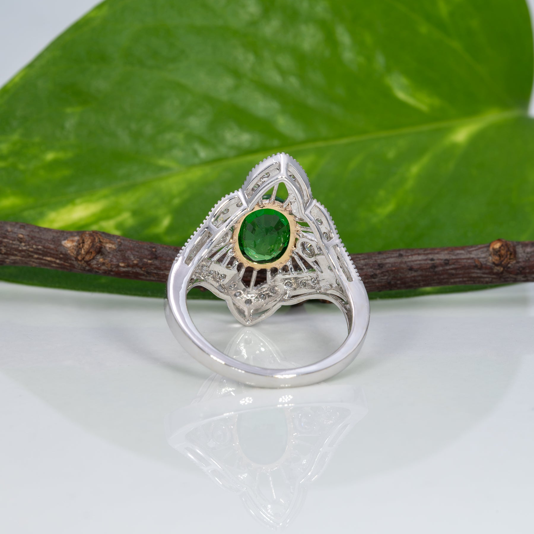 14K two-tone gold tsavorite garnet ring with diamond accents