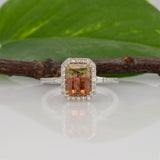 14K white gold bi-color tourmaline emerald-cut ring with diamond halo