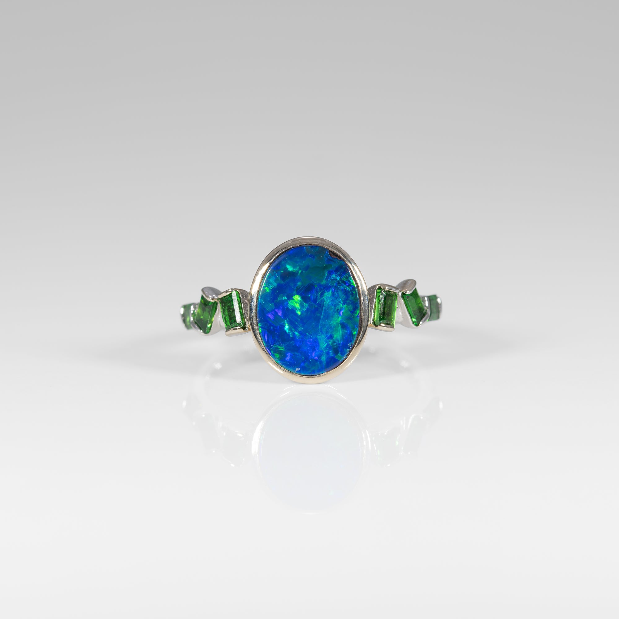 14K white gold boulder opal cabochon ring with tsavorite accents